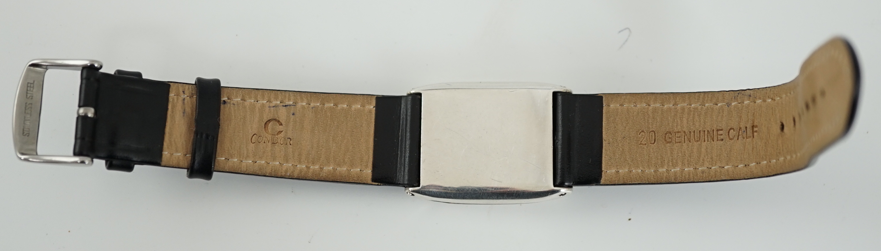 A gentleman's late 1920's silver flip action manual wind rectangular wrist watch